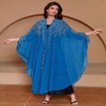 Swimming Gear Hooded cape-style top with rhinestone and bead embellishments